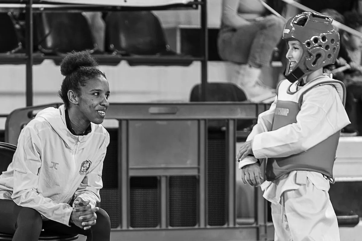 © Lawrence Banahan — Émotion entre coach et athlète